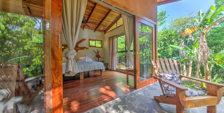 The Jungle cabins of Mystica Lodge and Retreats offer a private deck from where you enter the room. The room has a sliding door and two glass walls to make you feel one with nature.